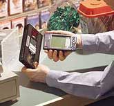 Palm Pilot ringing up sale running pocket register